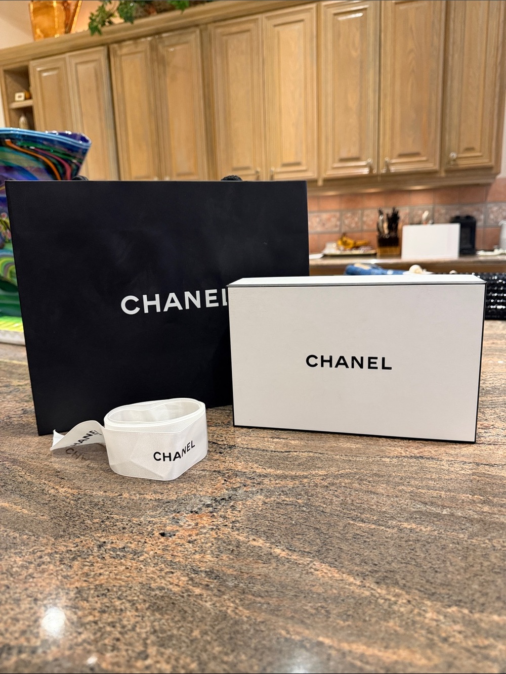 Chanel shopping bag, box and ribbon